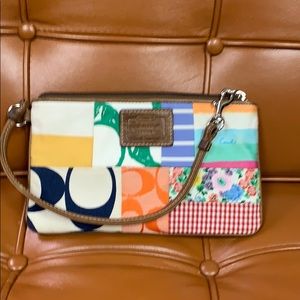 Small authentic coach wristlet.  Summer!